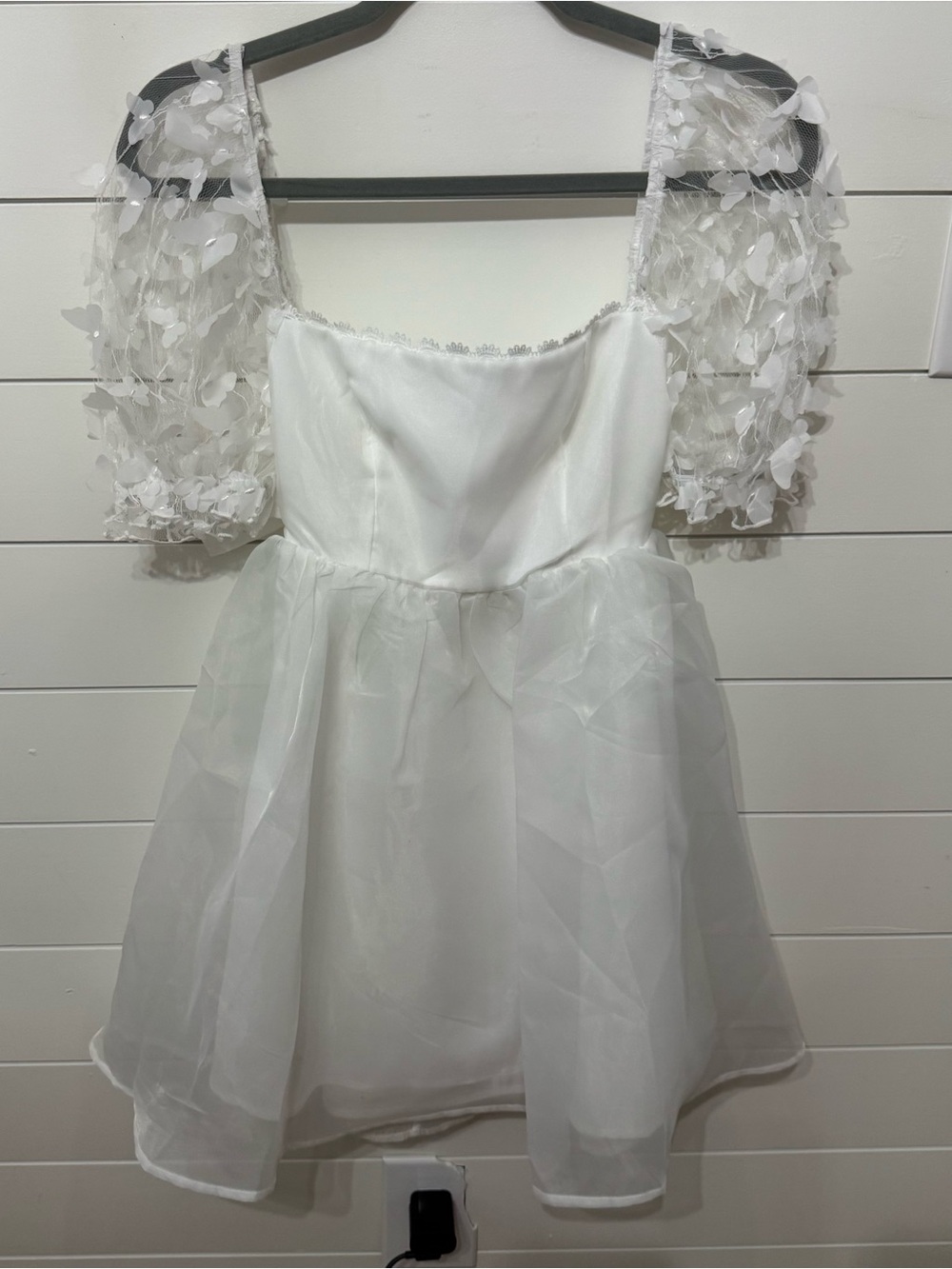 Mini dress with butterfly sleeves